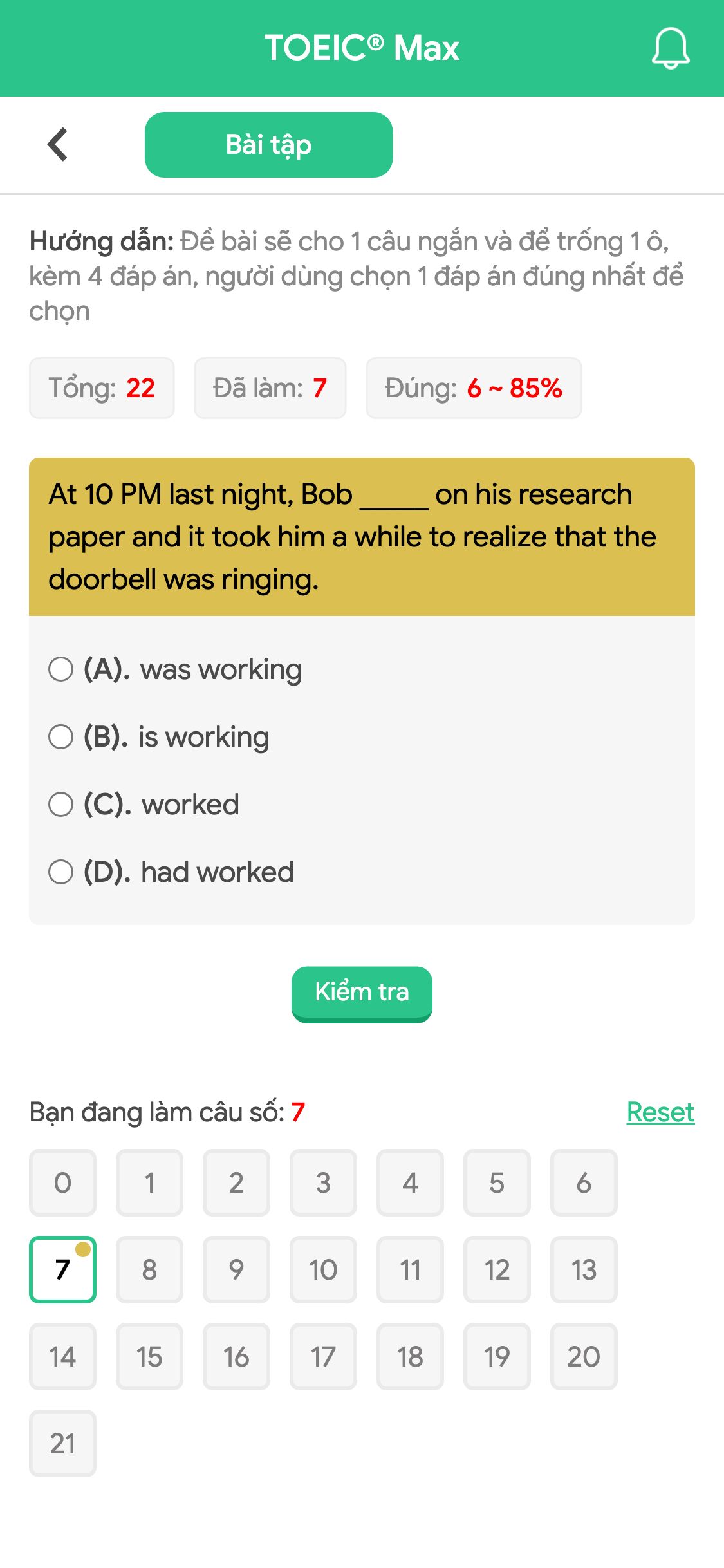 At 10 PM last night, Bob _____ on his research paper and it took him a while to realize that the doorbell was ringing.